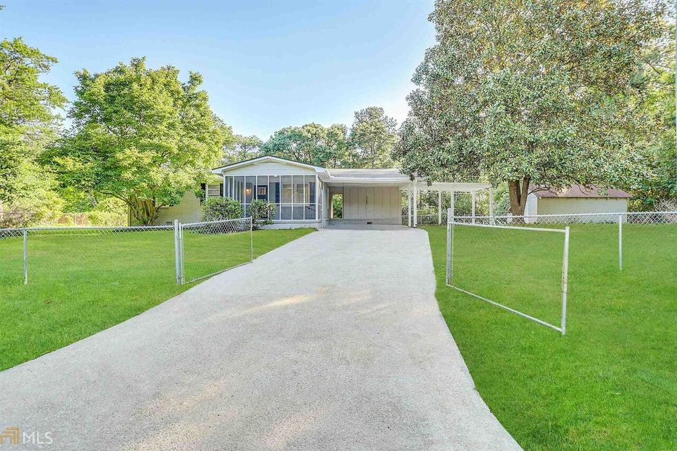 7704 Union Grove Rd, Lithonia, GA 30058 - photo 1