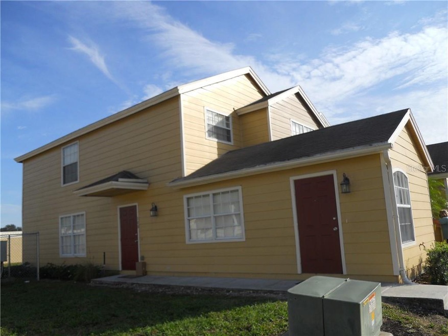 100 Washington Palm Loop, Davenport, FL 33897 - photo 1