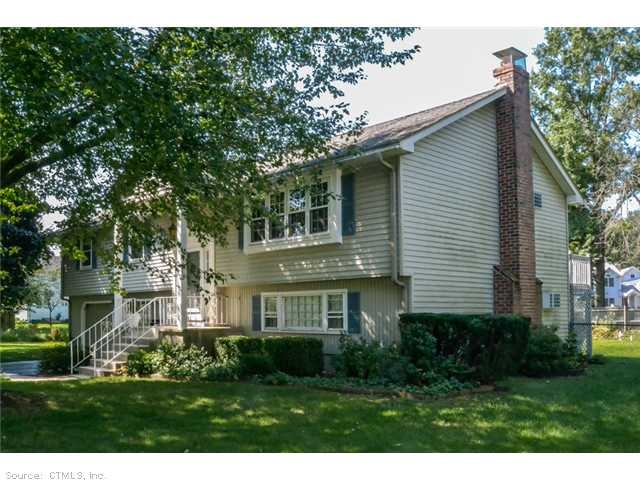 Exterior Front. Maintenance free vinyl sided raise
