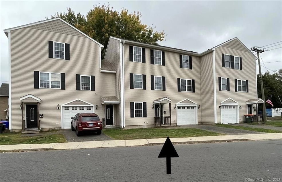 1 Pasco Place is the middle unit of this 3 unit co