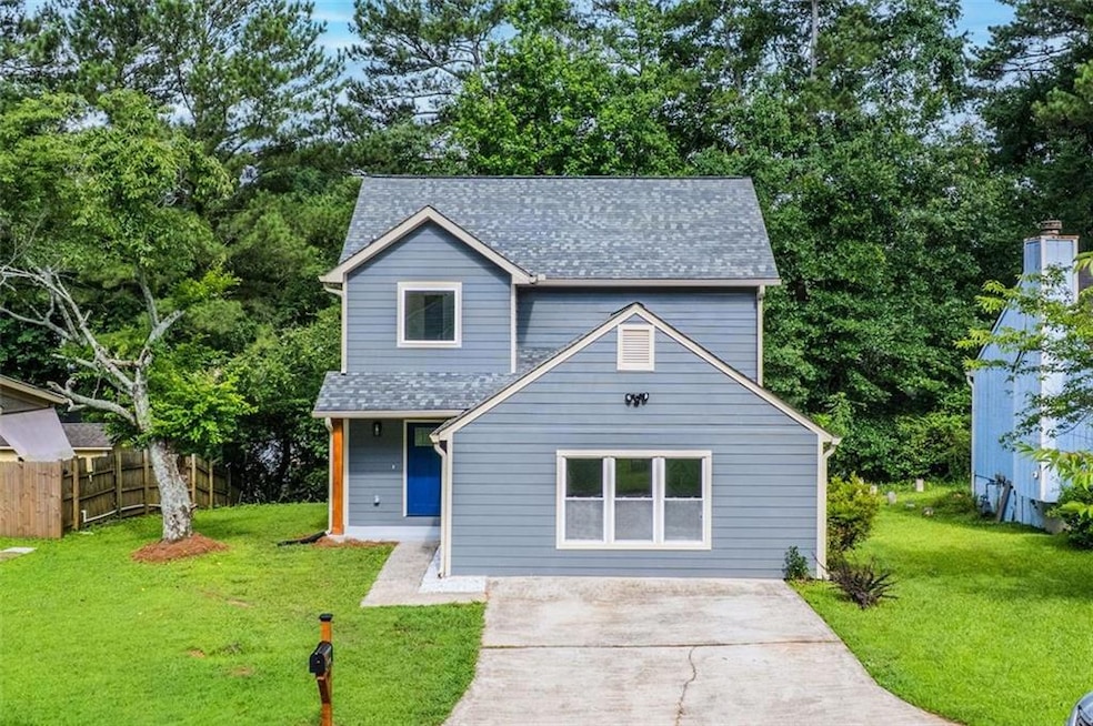 597 Woodcrest Manor Dr, Stone Mountain, GA 30083 - photo 1