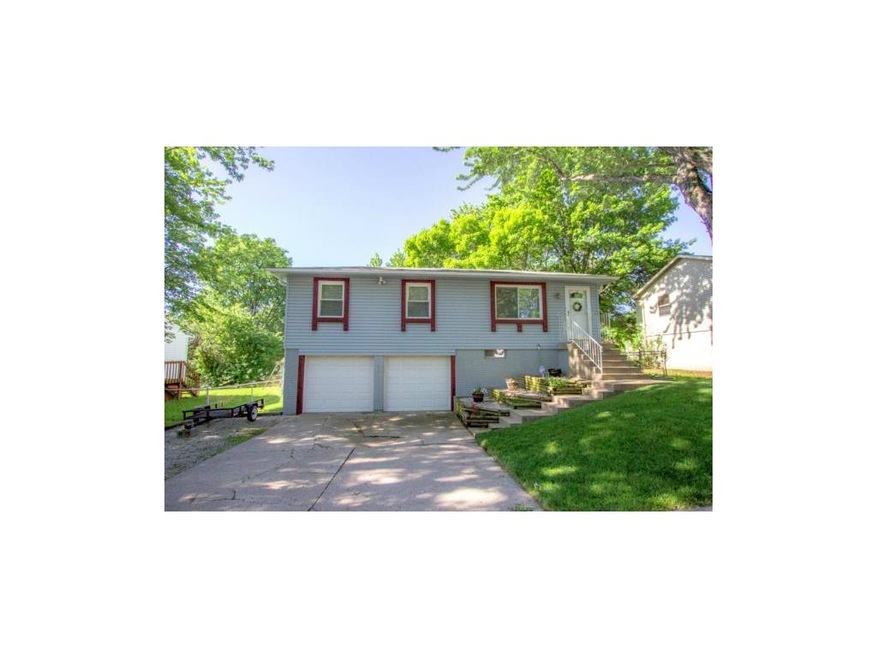 Raised Ranch with 2 Car garage and expanded parkin
