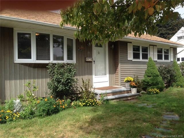 Delightful ranch home with attached garage and enc