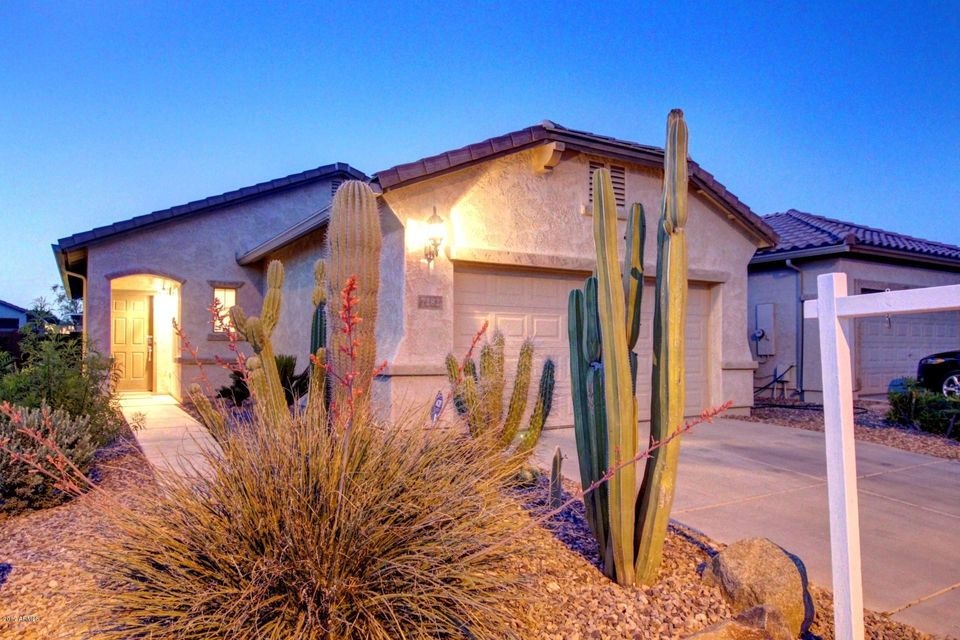 FRONT OF HOME AT SUNSET
