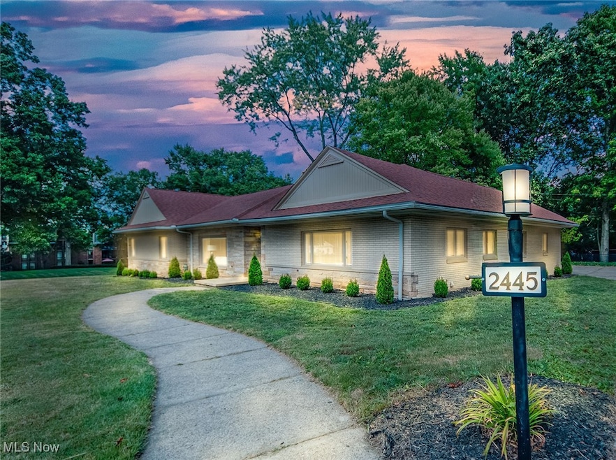 Warm and welcoming twilight view of the exterior of the home.