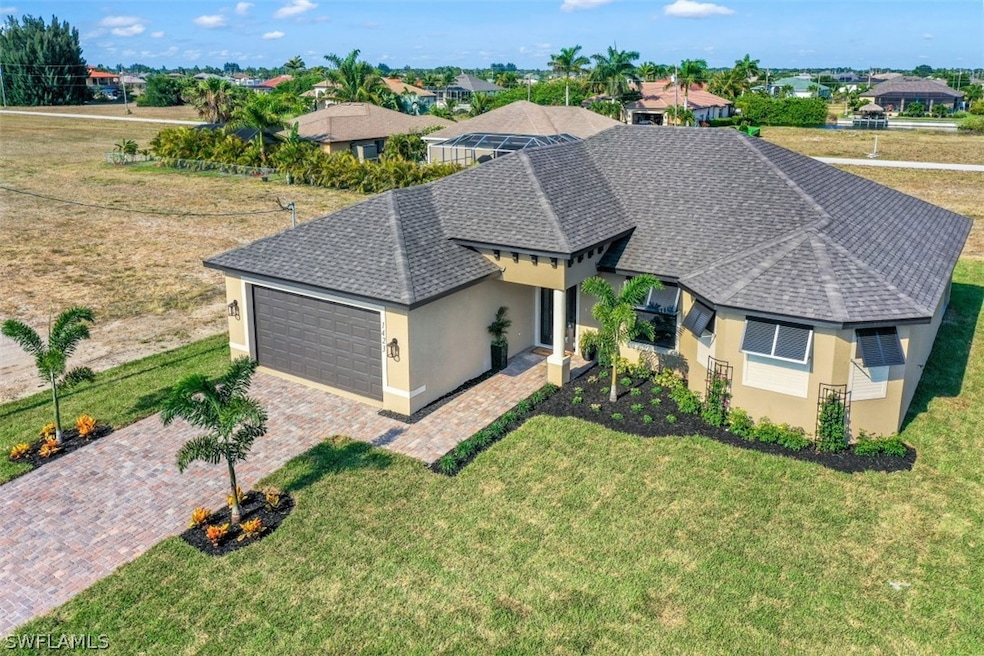 Exquisitely upgraded 4 BR New Construction IDEALLY LOCATED in the most desirable area of NW Cape Coral!