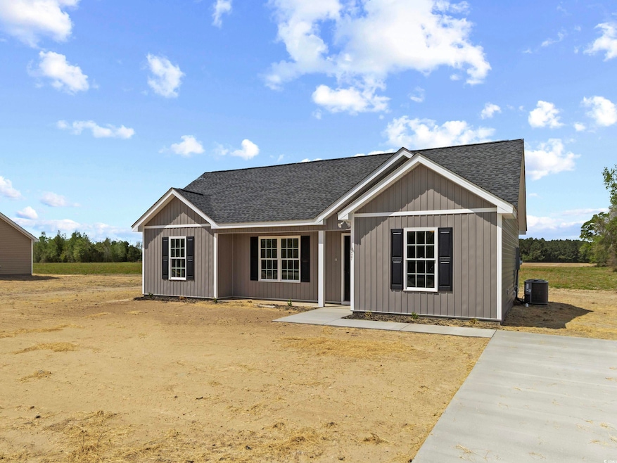 View of front of property with a shingled roof and cooling unit