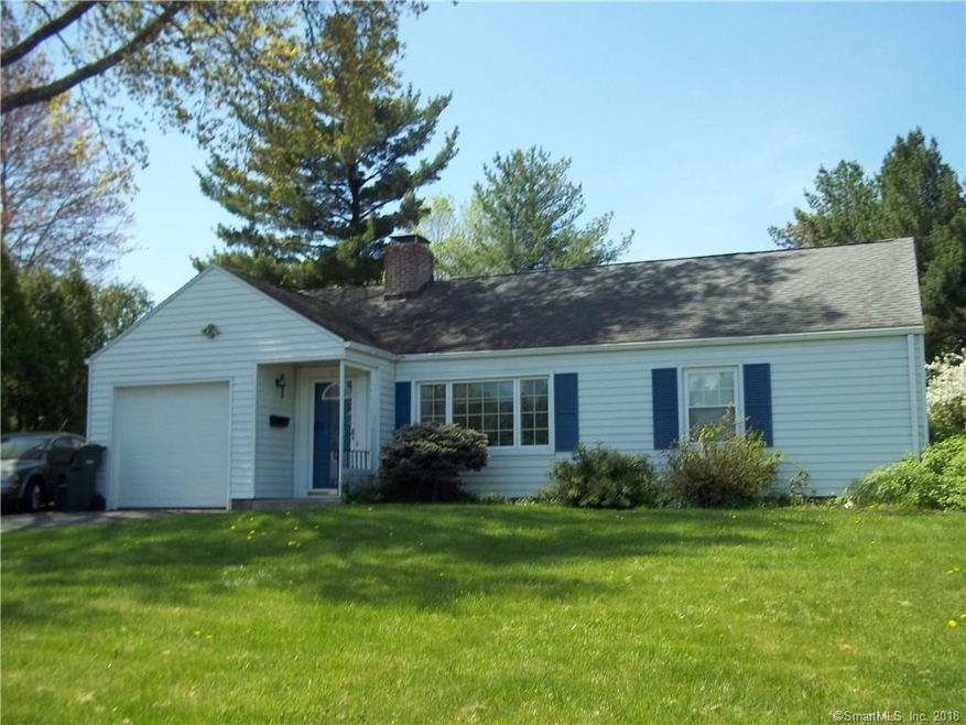Front view of 57 OlneyRd, note new garage door & g