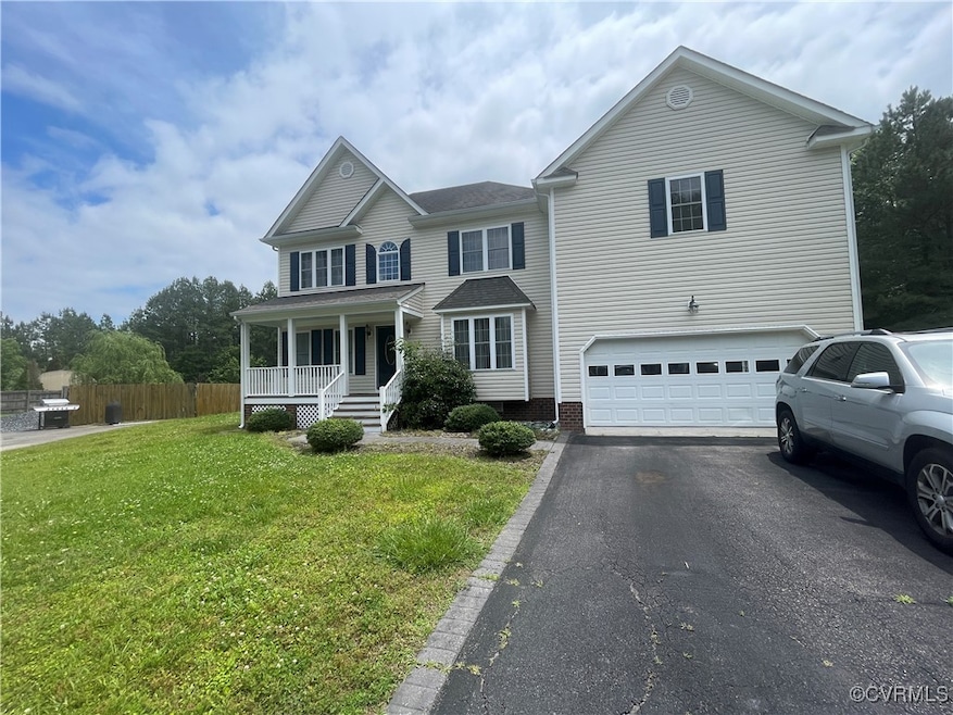 View of front of property featuring covered porch,