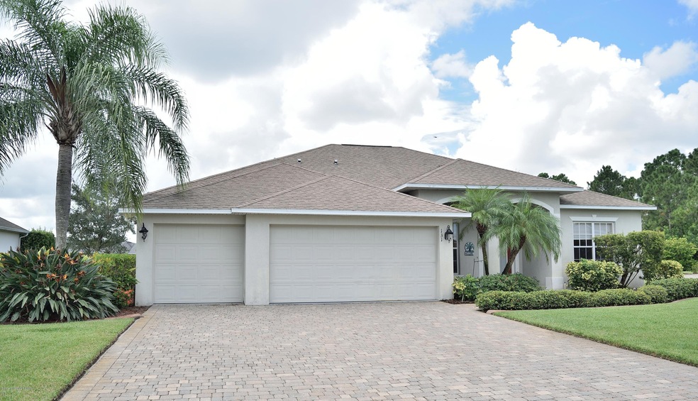 3 car garage & paver driveway