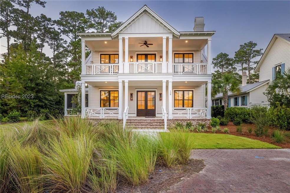 View of front of property featuring a balcony and