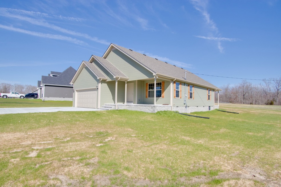 This beautiful home comes with all the country living and great location!