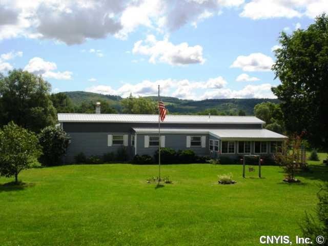 Exterior Front Pretty homestead perched on 7 acres
