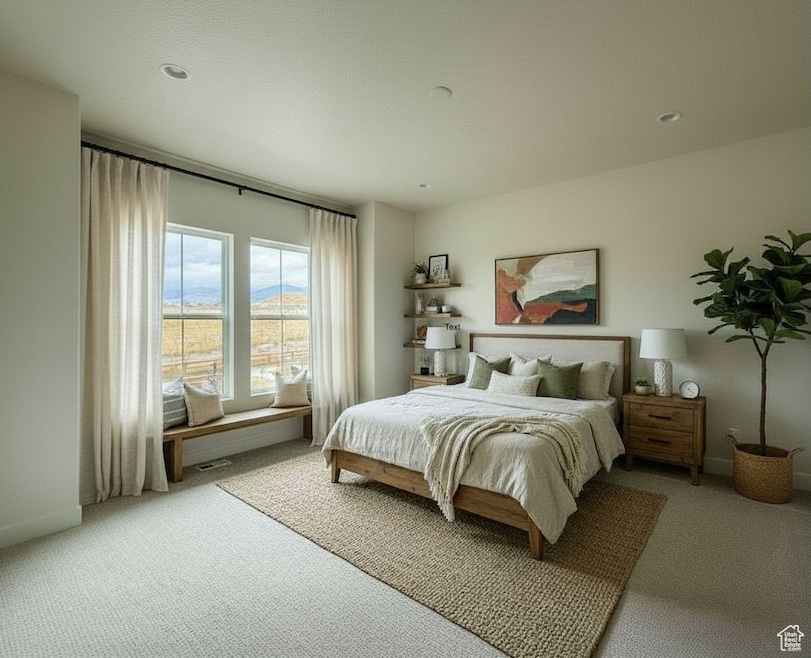 Carpeted Primary featuring recessed lighting and 10 ft. ceilings.