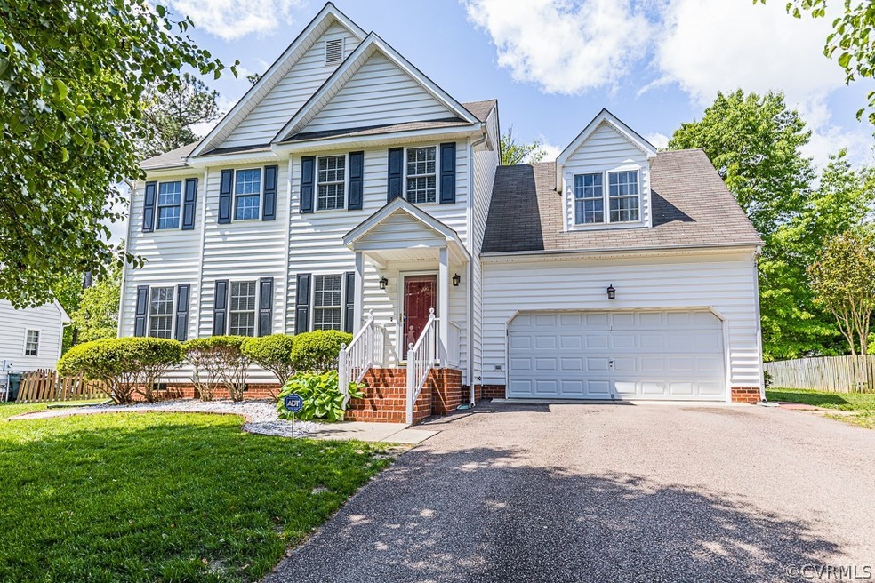 FRONT ELEVATION, PAVED DRIVEWAY, MAINTENANCE FREE
