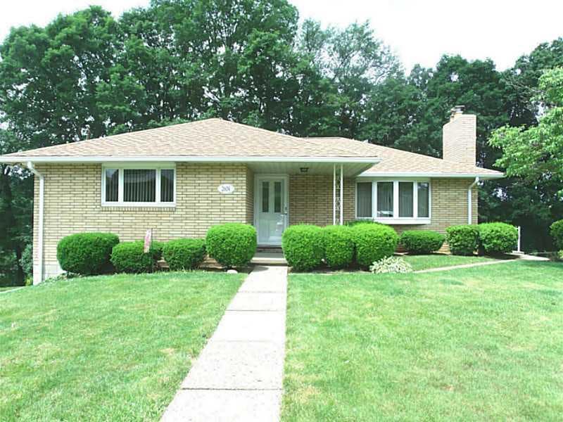 Exterior Front. Charming brick ranch situated on a