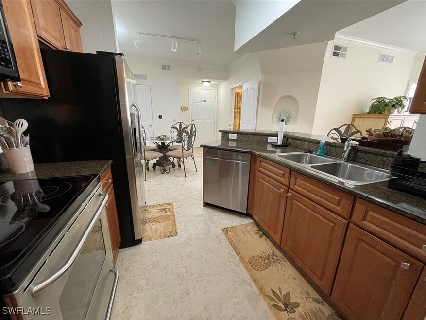 12935 Violino Ln unit 205, Naples, FL 34105 - photo 1