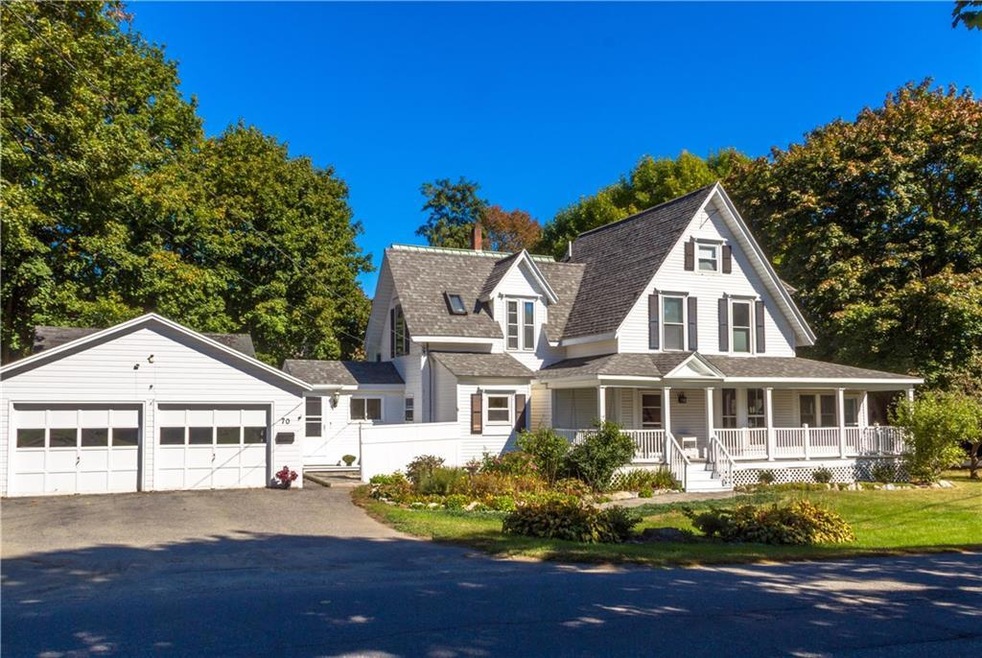 Exterior home with detached two car...