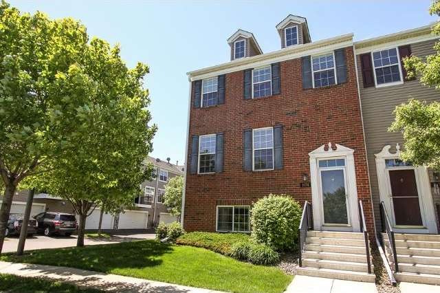 Stunning end unit, large sun-filled rooms, open co