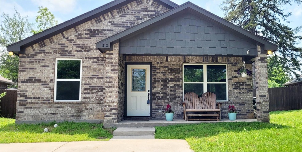 1112 W Day St, Denison, TX 75020 - photo 1