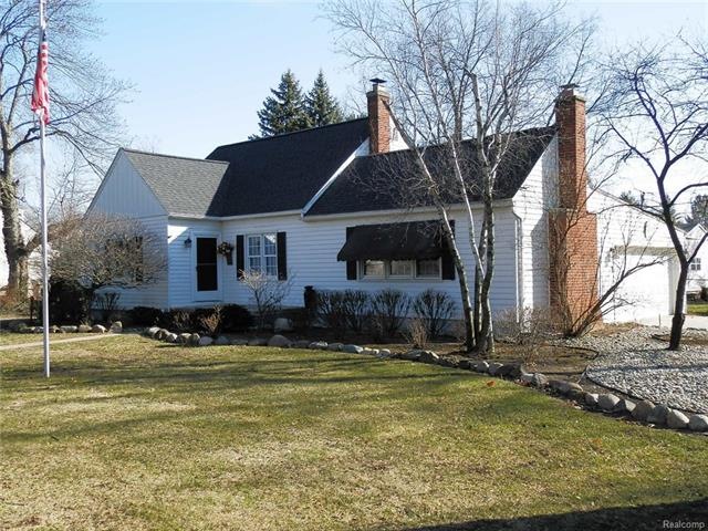 Front yard with extensive landscaping.