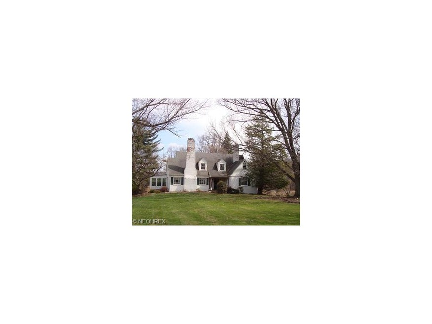 This unique  4 bedroom home sits on 5 acres. There