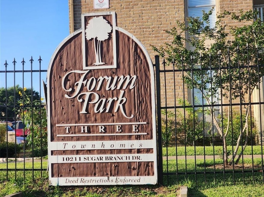 This photo shows the entrance sign for Forum Park