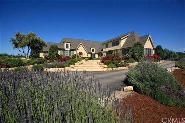 The luxurious 3,864 square foot custom home sits a