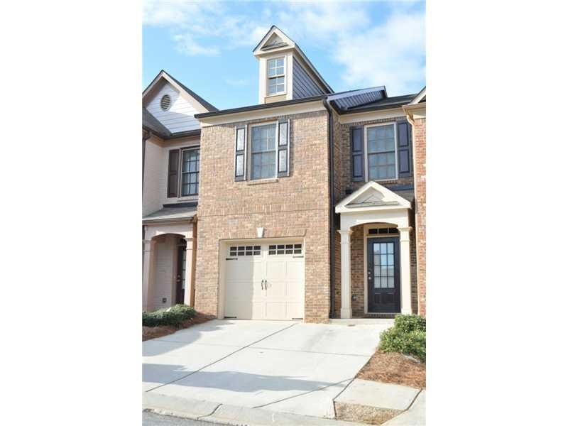 Exterior Front. Full front brick with a covered fr