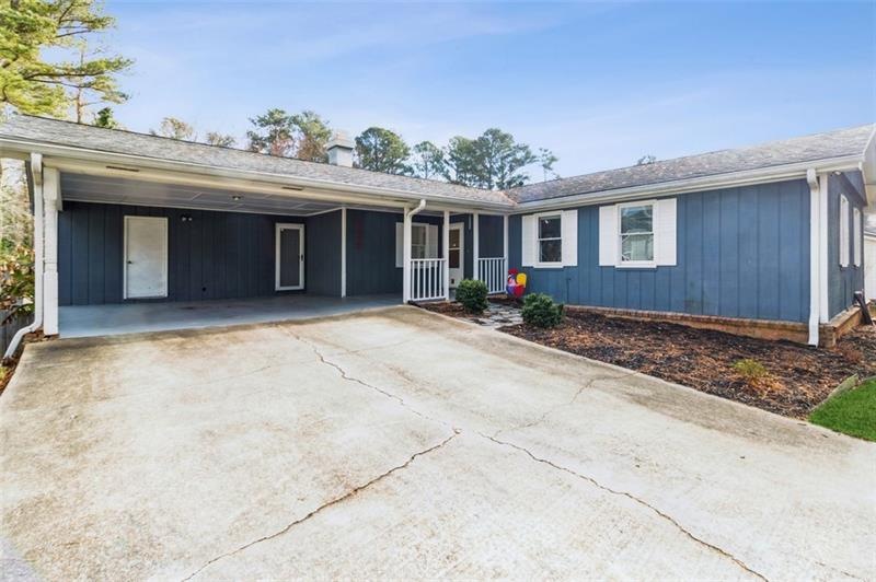 Ranch with 2 car carport and extra parking