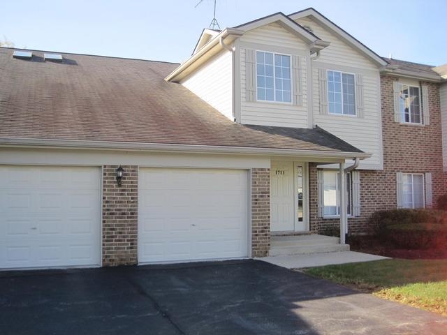 1711 Chesapeake Ln unit 1, Schaumburg, IL 60193 - photo 1