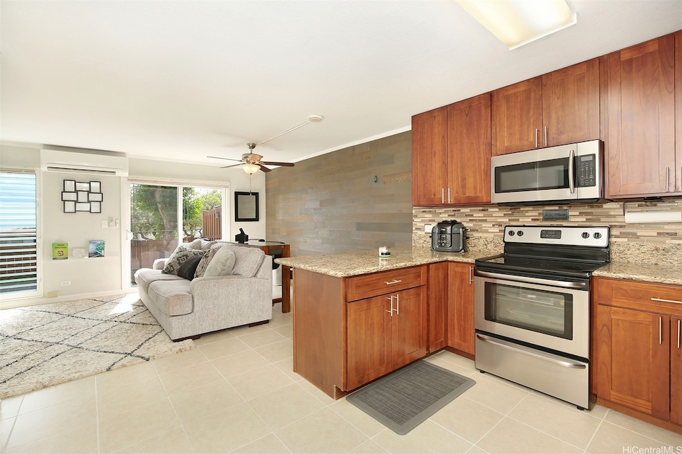 Renovated kitchen opens to the living room