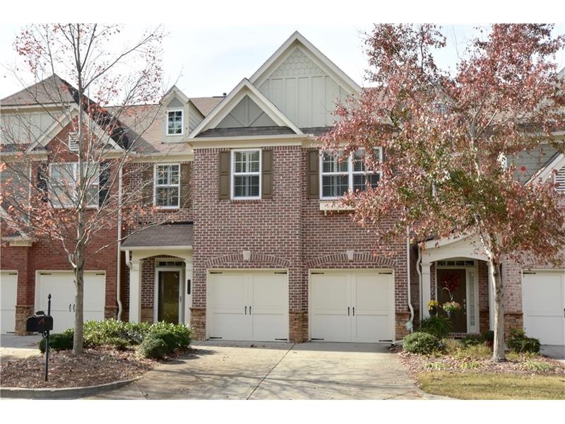 WONDERFUL BRICK TOWNHOME IN GATED COMMUNITY.