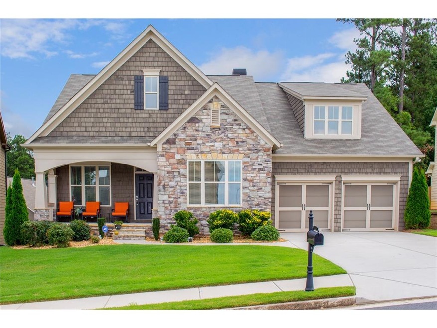 IMPECCABLE FOUR BEDROOM HOME WITH TWO CAR GARAGE