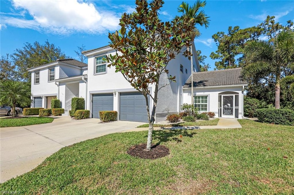 Traditional-style house with an attached garage, s