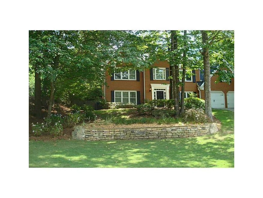 Exterior Front. 3 sides brick