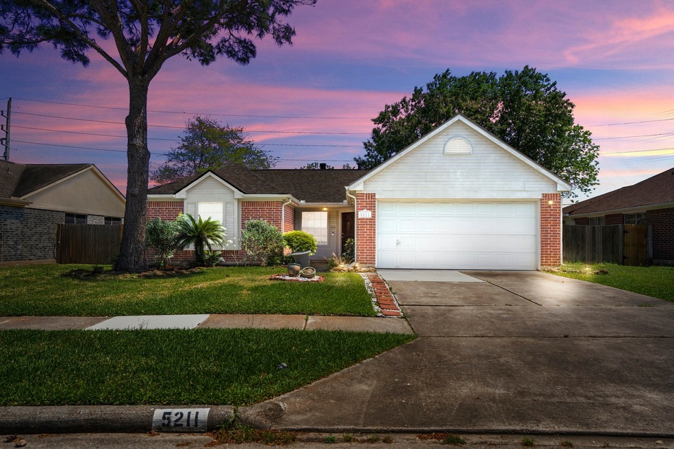 Welcome home to 5211 Roserock Lane!