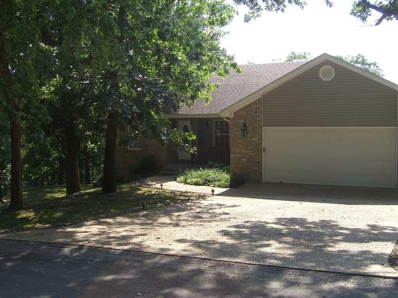 Exterior Front. private setting. House comes on two lots and two other lots are available. you coul own the street