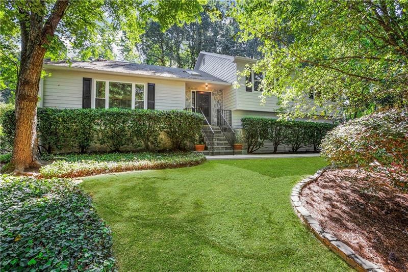 Beautiful exterior, shady front lawn
