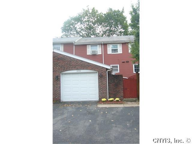 Exterior Front. 1 car attached garage with garage 