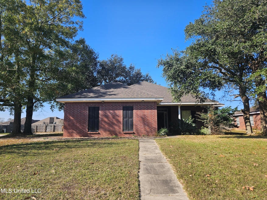 7726 Falcon Cir W, Ocean Springs, MS 39564 - photo 1