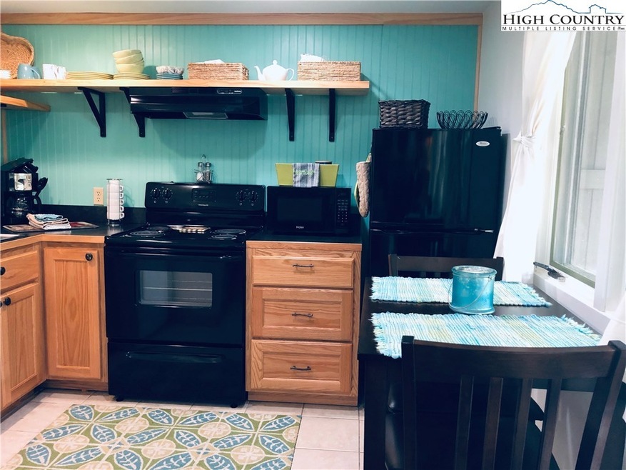 Fully equipped kitchen with new cabinets, applianc