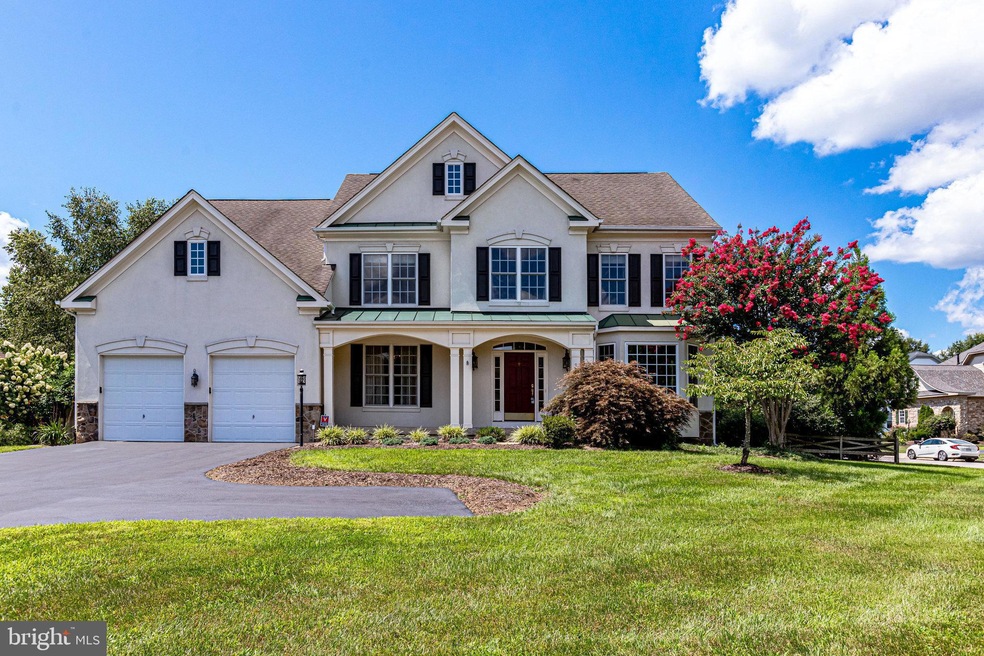 9070 Roaring Spring Loop, Bristow, VA 20136 - photo 1