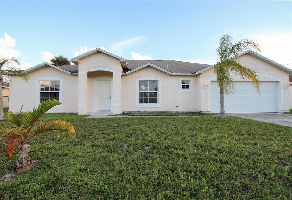 878 SW Squirrel Ave, Port Saint Lucie, FL 34953 - photo 1