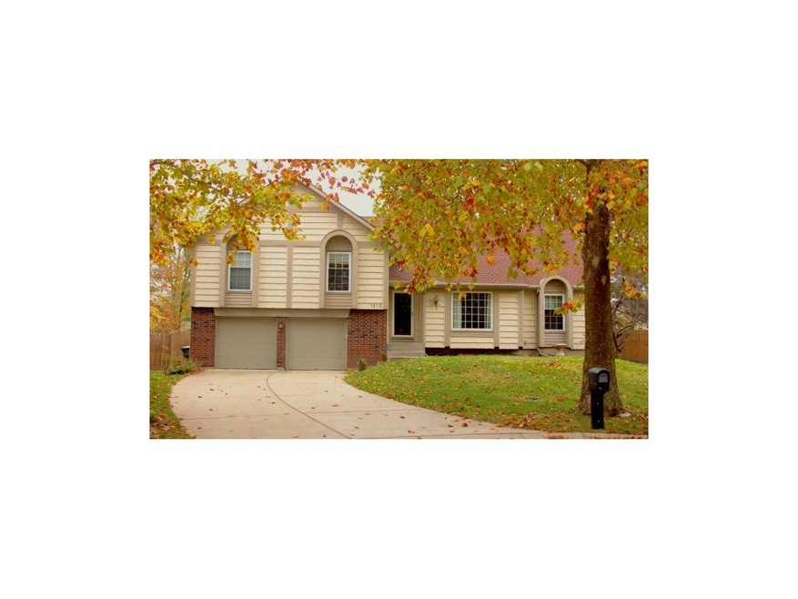 Beautiful home with fall foliage.