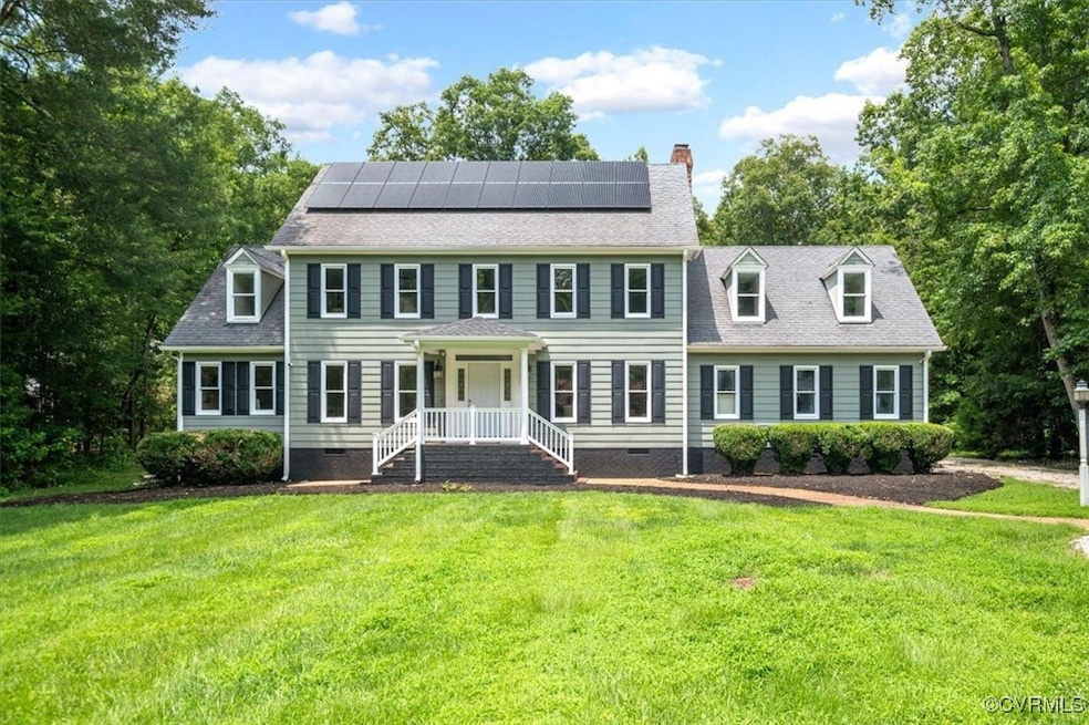 Colonial-style house with crawl space, solar panel