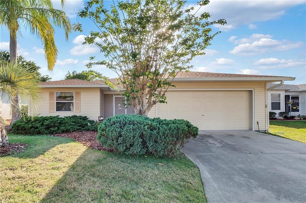 Exterior front 32811 Timberwood Dr. Fresh landscaping and new roof and gutters