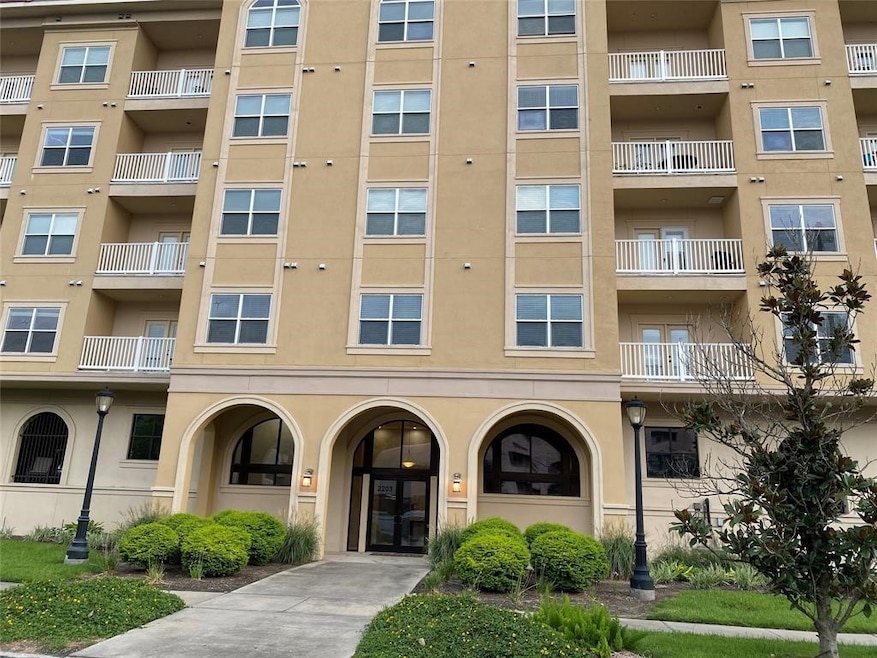This is a modern multi-story apartment building wi
