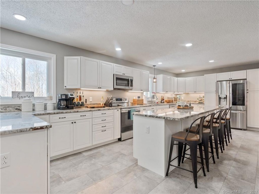 727 Squaw Rock Rd, Moosup, CT 06354 - photo 1