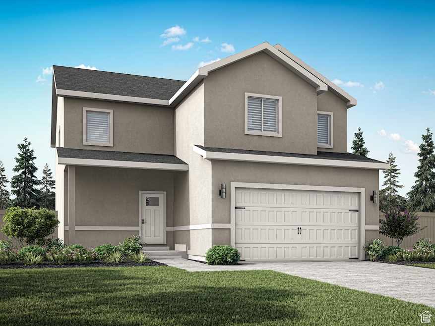 Traditional-style house featuring a front yard, stucco siding, a garage, and driveway
